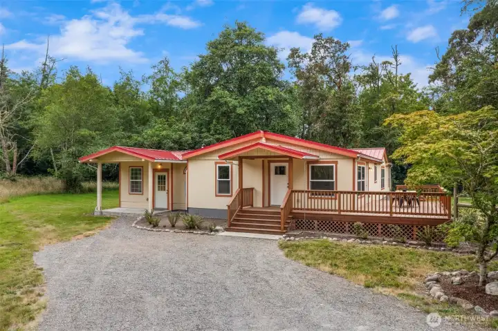 Manufactured home features a bonus room, extensive deck and fenced in yard. Manufactured home features a bonus room, extensive deck and fenced in yard.