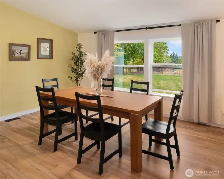The dining room is just off the kitchen and large enought for entertaining. The dining room is just off the kitchen and large enought for entertaining.