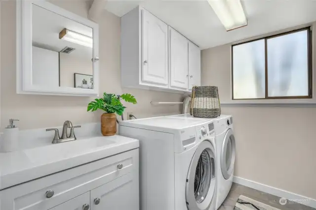 This laundry room also serves as a 1/2 bath on the lower level....