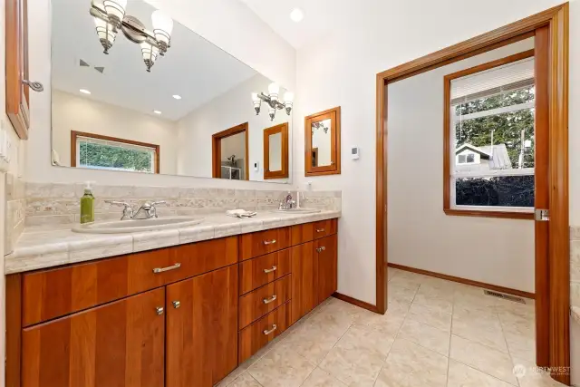 The Primary bedroom bathroom with two sinks.