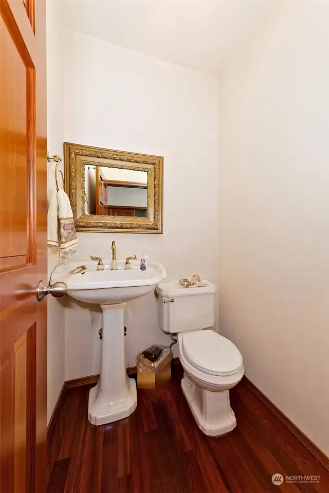 This is a half bath near the entry for guests.