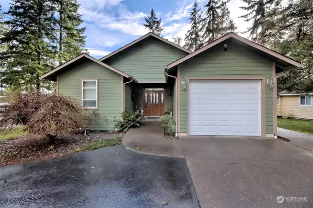 From the street - notice the 2-car attached garage, then there's another detached shop.