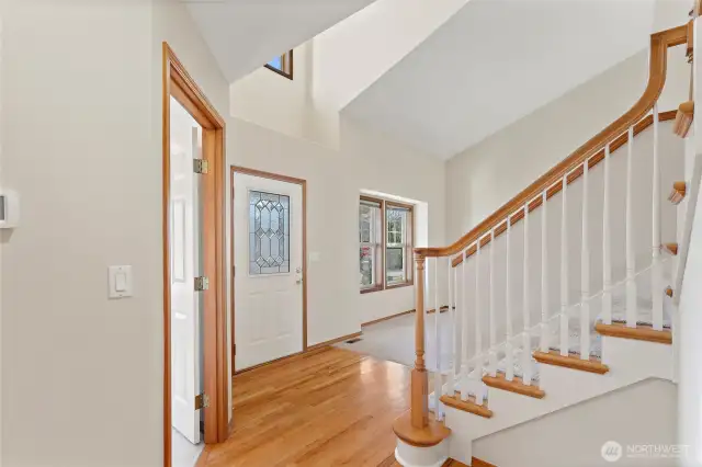 View of the front entry way.Cathedral ceilings and tons of natural light.