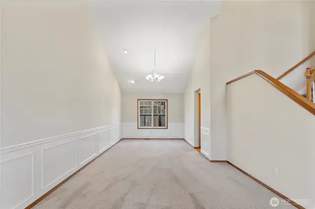 Formal Living/dining room with Vaulted ceilings.