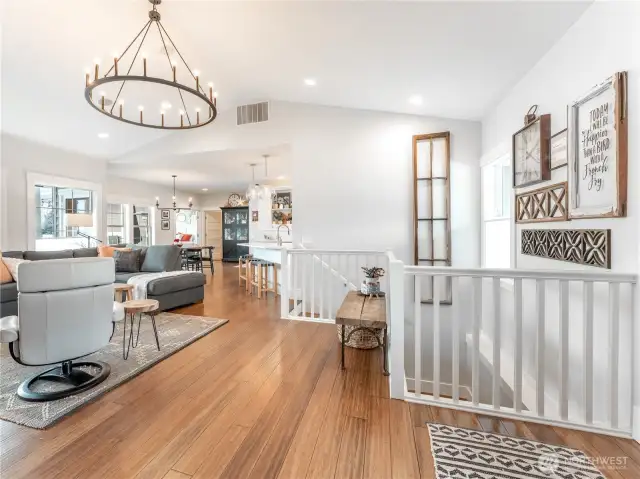 Spacious entry area with new lighting and Bamboo flooring