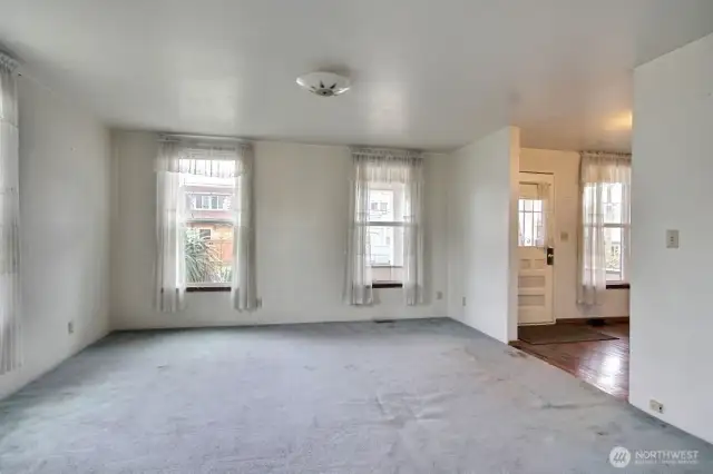 Living room and front entry area.