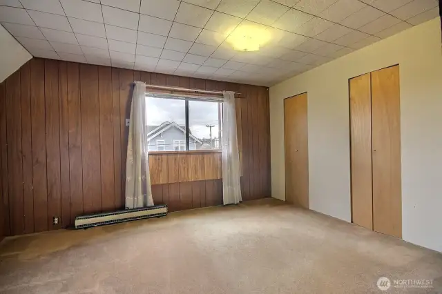 Primary bedroom with dual closets has an attached small bonus room - perfect for nursery, home gym or meditation
