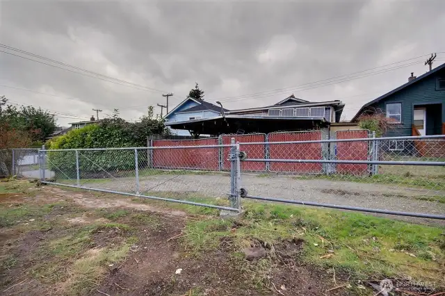 Secure, gated access from alley to both parcels.