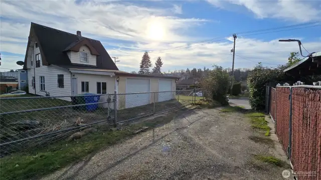 Alley provides access to the 2-car garage and 2nd lot.