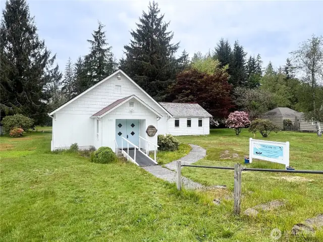 Highway 101 access meets community charm at this well-situated property