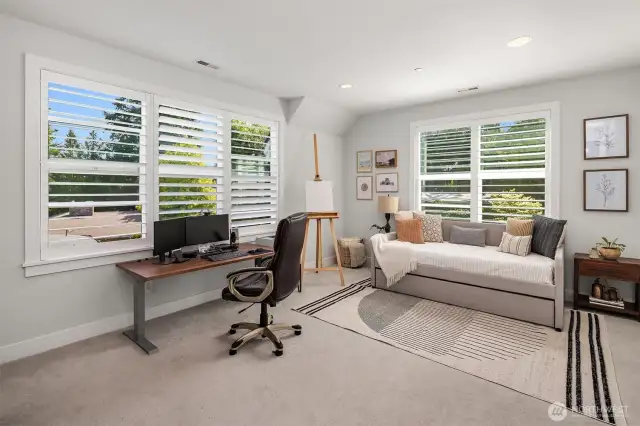 Two additional well-appointed bedrooms complete the upper sanctuary.