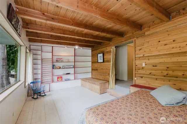 Large room downstairs being used for sleeping space.