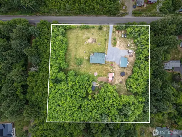 Beautiful property surrounded by trees for privacy.