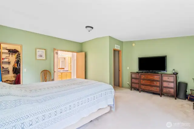 Primary has room for a king bed and a sitting area.