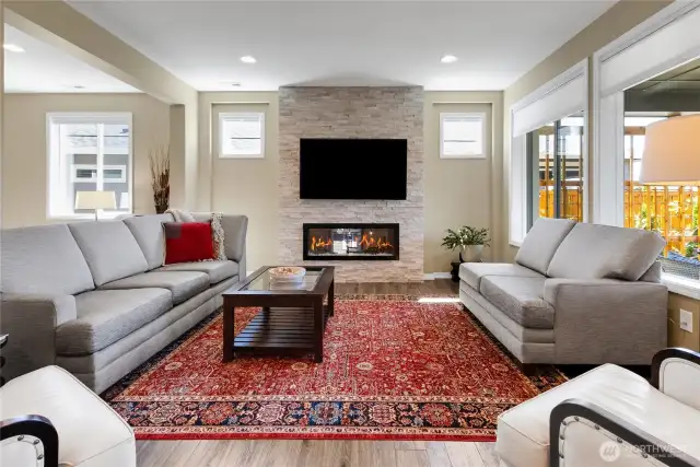 Check out how light bounces around your open living room with an owner-improvement of cut-stone fireplace.