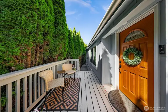 Front porch with gravel path to the backyard