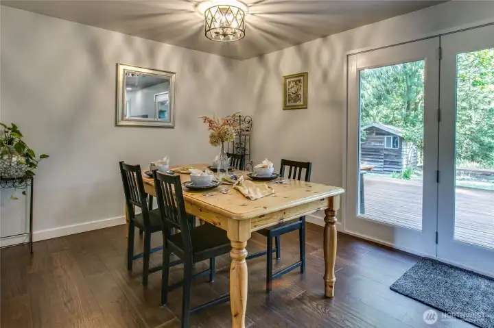 Dining room w/ glass doors to the deck
