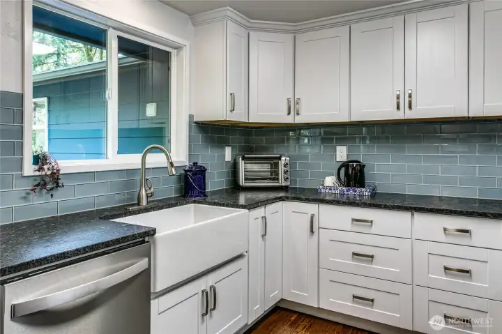 Leathered granite counters and farm sink!