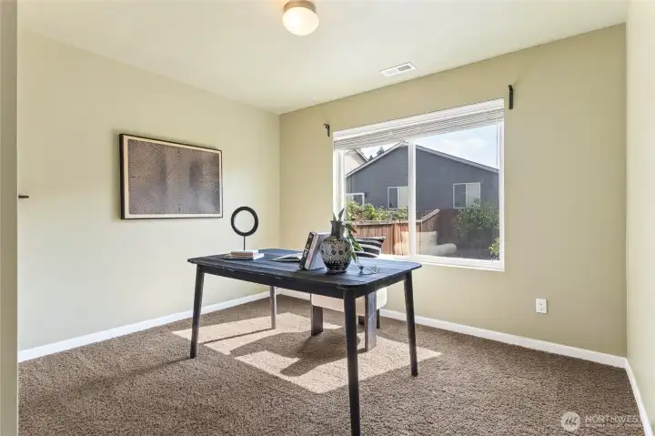 main level office or bedroom offers flexible options