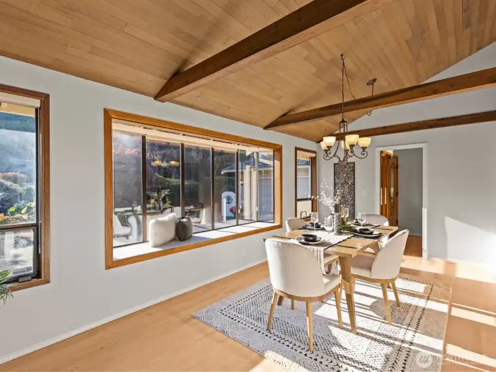 Enjoy hosting formal dinner parties? Easily fit a table that accommodates 14-16 guests. The gorgeous wood beams just enhance the ambiance.