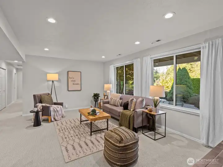 You're welcomed by a rec room overlooking the expansive patio.