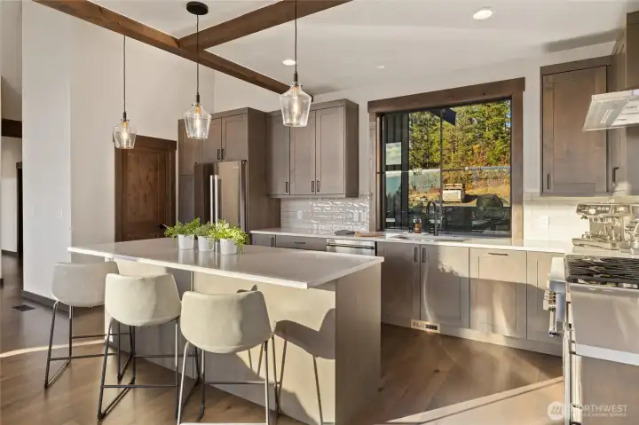 Kitchen area with island eating space