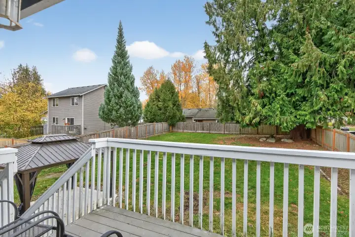 The back deck off the dining room offers the perfect spot for morning coffee or evening barbecues.