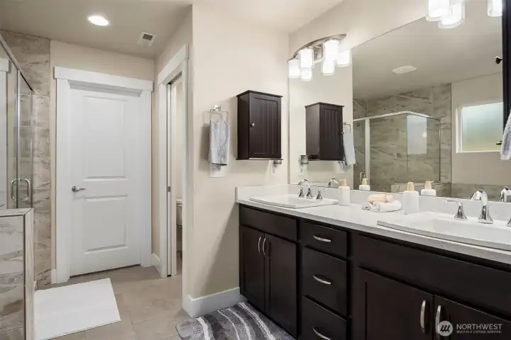 Wonderfully appointed primary bathroom.