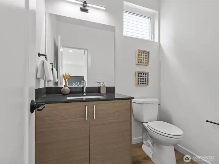 Convenient powder room on the main living area! Model home.