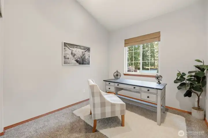 Bedroom #1 with vaulted ceilings off of the great room