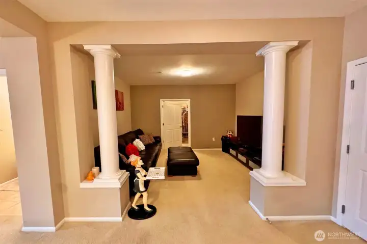 This large versatile Den with high quality columns, perfect for your guests or a game/TV room!