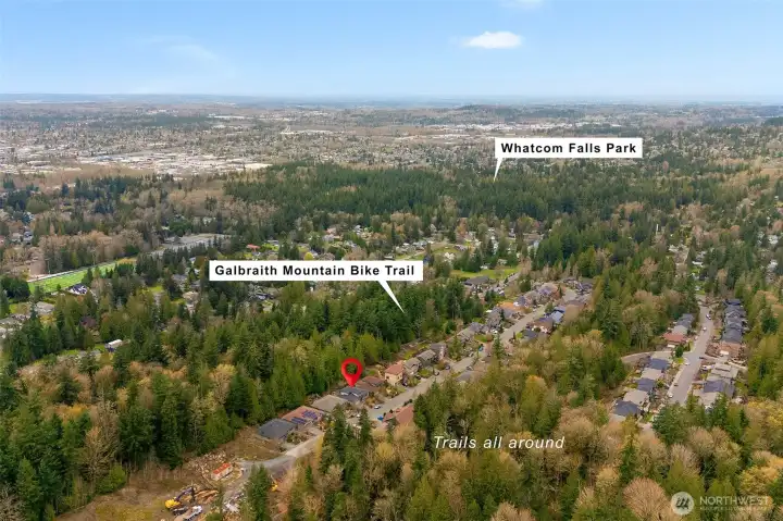 Surrounded by trees and nearby trails, setting offers a balance of privacy and connection to nature while remaining close to everyday amenities.