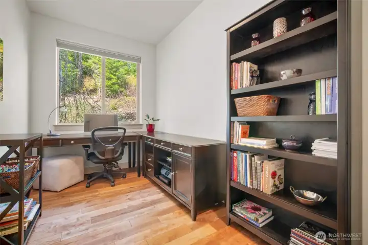 Flexible use room on the main floor overlooking the garden, ideal for office or studio.