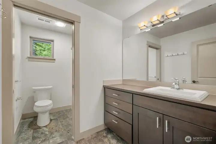 Full bath serving the second floor bedrooms.