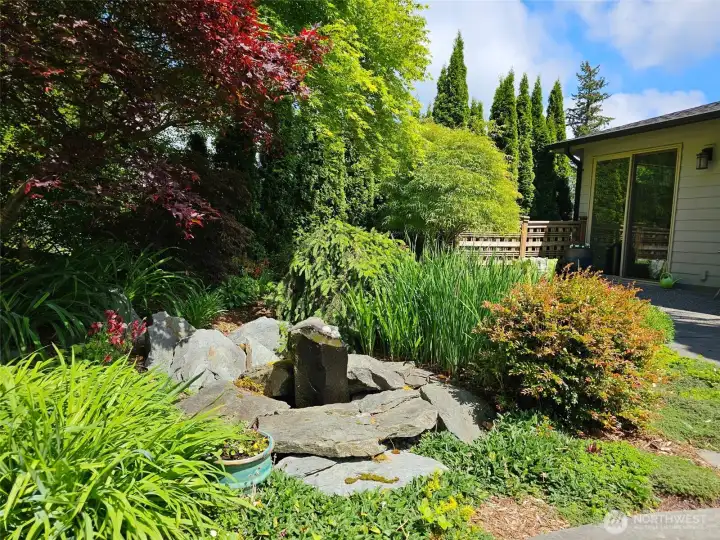 Enjoy the serene water feature while relaxing