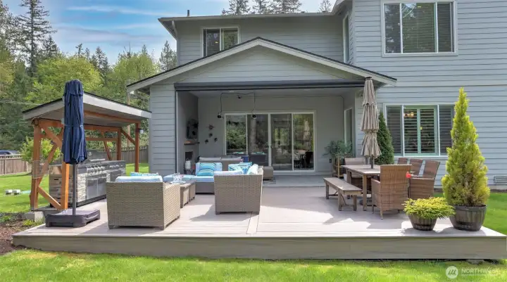 Enormous Kitchen Aid BBQ with covered roof space and newly added composite deck.