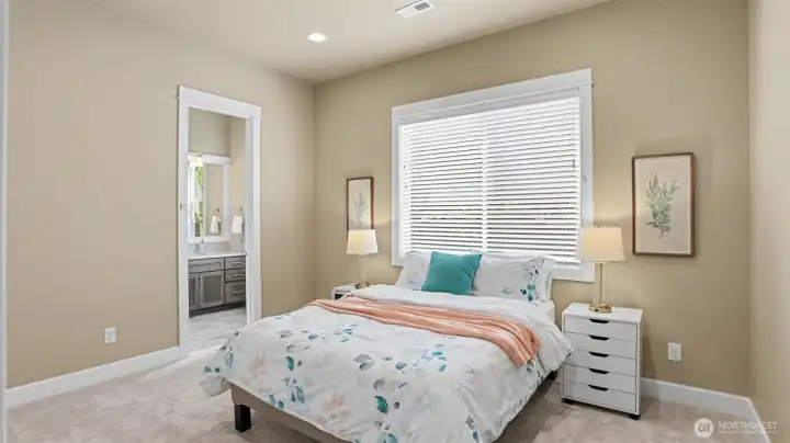 Private main level suite with full bath and walk-in closet