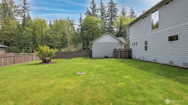 Fully fenced .64 private acre homesite offers a truly one-of-a-kind level and usable backyard. Sprinkler system in front and backyard.