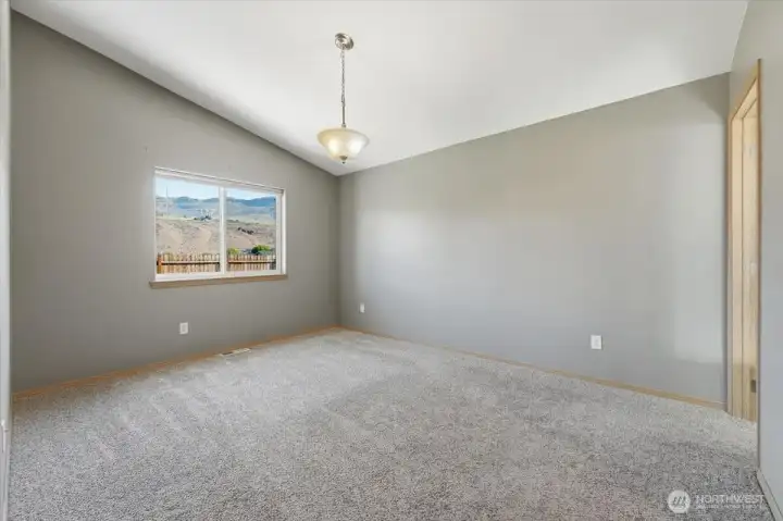 Primary bedroom is located off the living room and has walk in closet and full bath.