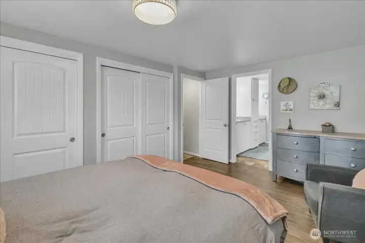 Primary bedroom double closets and en suite bathroom