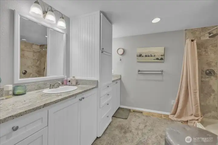 En suite primary bathroom with shower