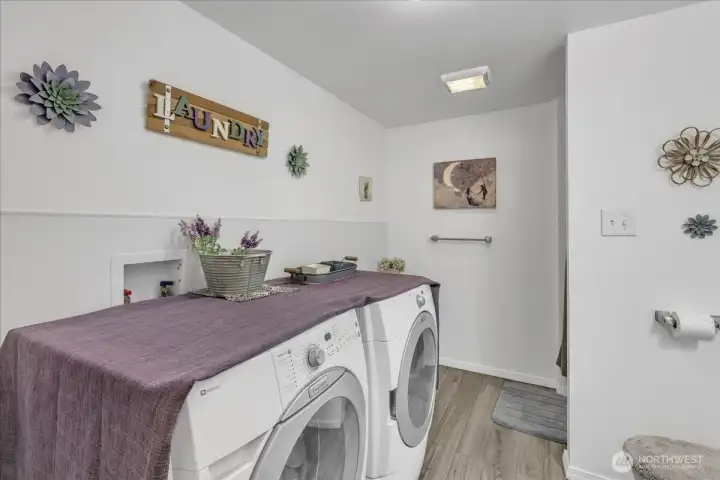 Downstairs three quarter bathroom with laundry