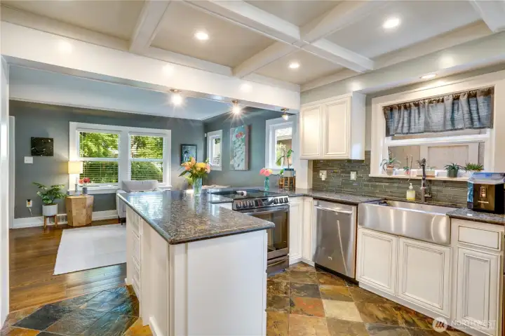 Solid stone countertops and single basin stainless steel sink