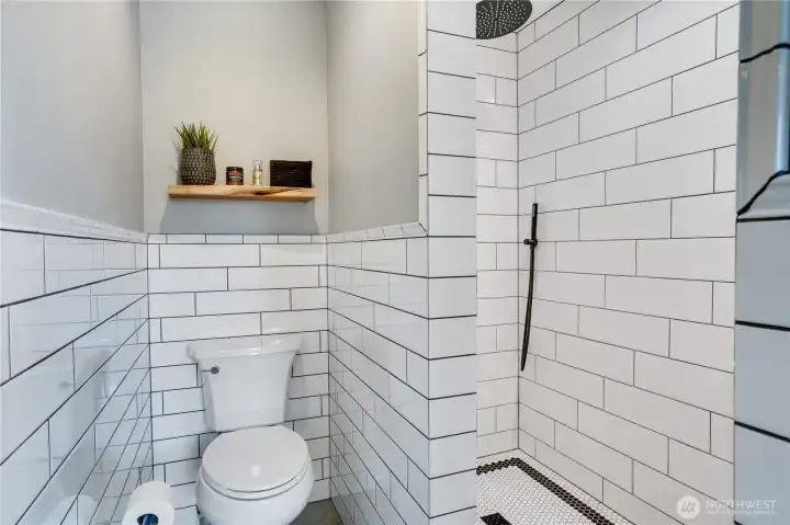 Built in storage in the stand up shower.