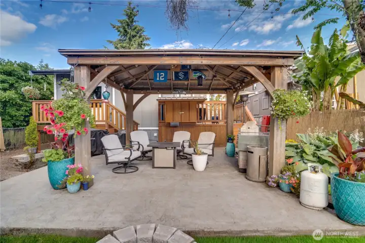 Your outdoor living room. Built-in television. Use this patio and outdoor space year round