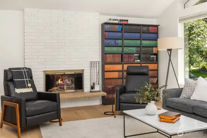 Cozy up by the fireplace for comfort and relaxation