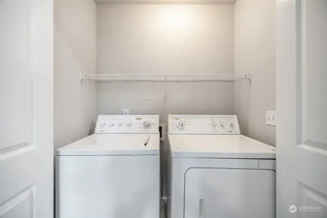 Upstairs also holds the laundry area with a washer and dryer that stay with the home.