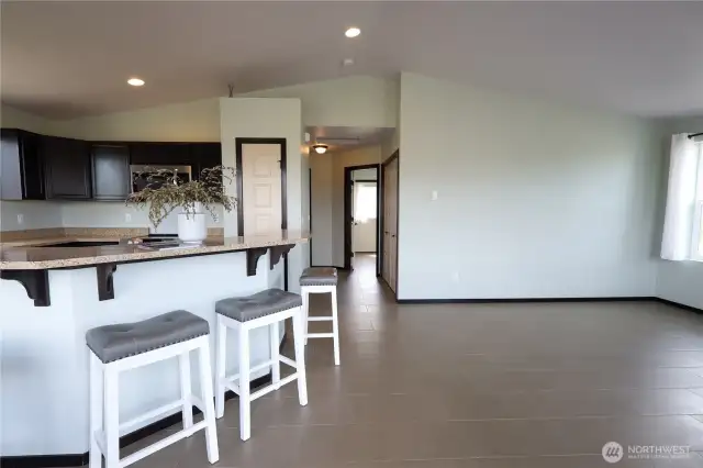 Tile on the floor throughout the house