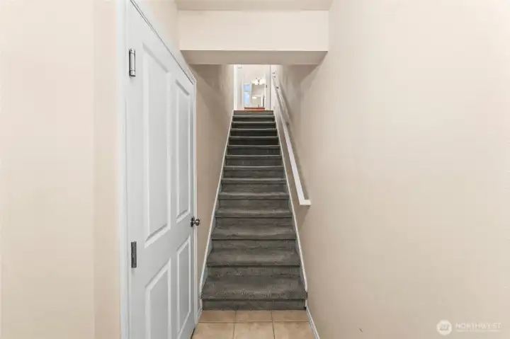 Entry w/garage door on the left.