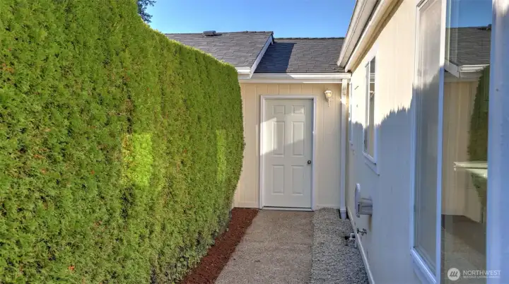 Separate garage entry to the patio.